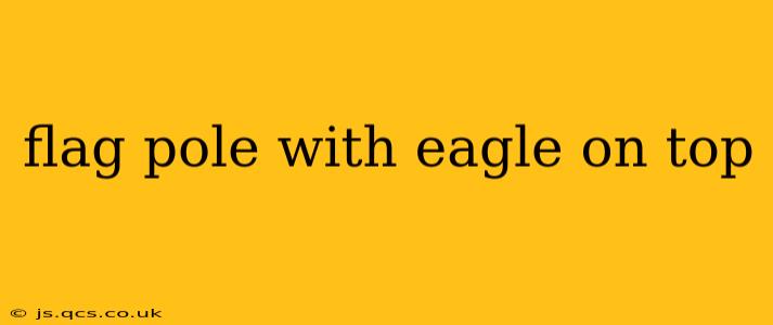 flag pole with eagle on top