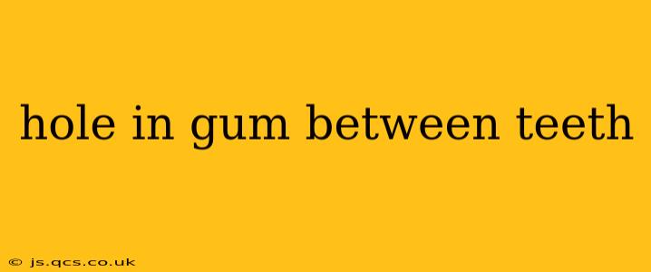 hole in gum between teeth