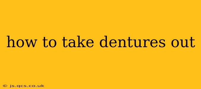 how to take dentures out