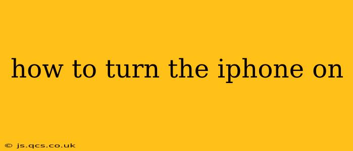how to turn the iphone on