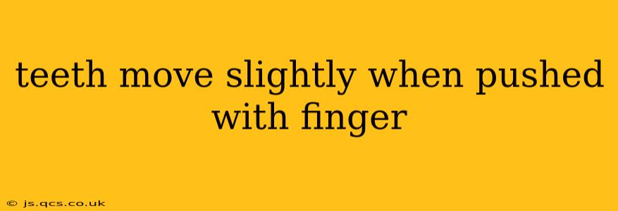 teeth move slightly when pushed with finger