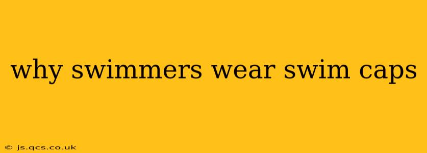 why swimmers wear swim caps